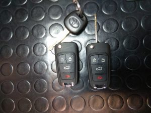 a car key and a spare for a toyota sequoia 2010